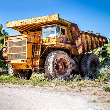 Operate a rigid body dump truck